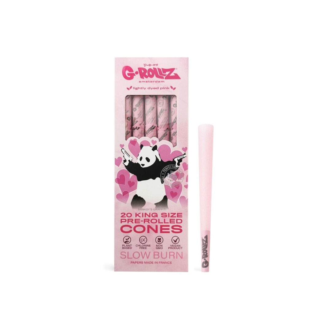 Ready-to-fill G-Rollz pink pre-rolled cones with the included wooden poker tool.